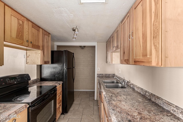 kitchen featuring baseboards, a textured ceiling, a sink, and electric range