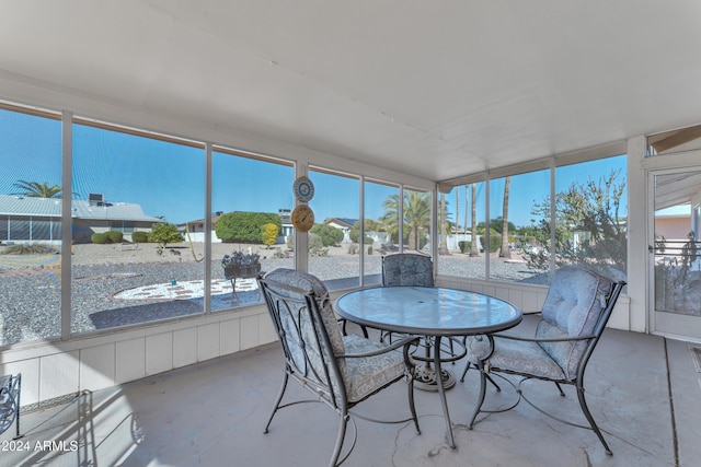 sunroom featuring a healthy amount of sunlight