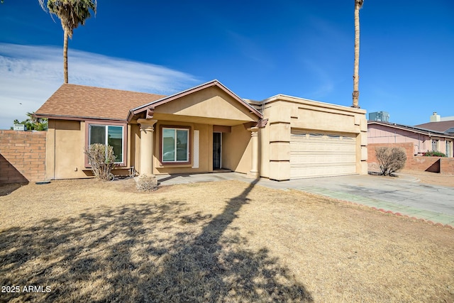 ranch-style home featuring a garage