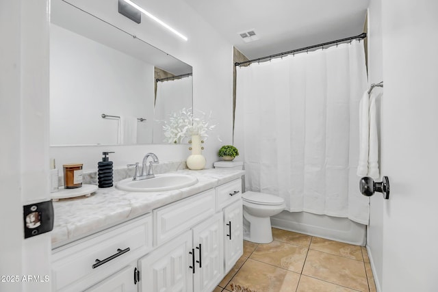 full bathroom featuring vanity, shower / bath combo, tile patterned floors, and toilet