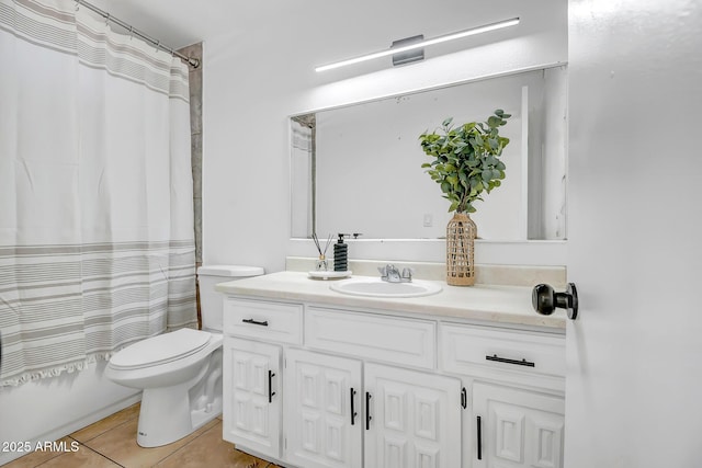 full bathroom with vanity, tile patterned flooring, toilet, and shower / tub combo with curtain