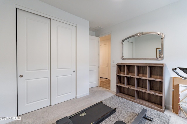 interior space featuring light colored carpet