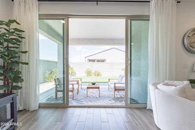 entryway with light wood-type flooring and a wealth of natural light