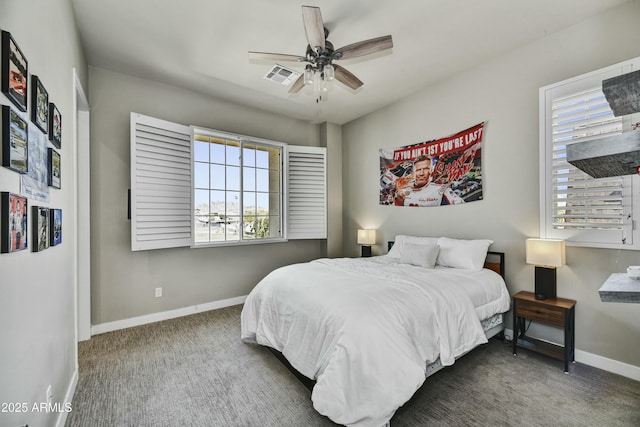 bedroom with visible vents, carpet flooring, a ceiling fan, and baseboards