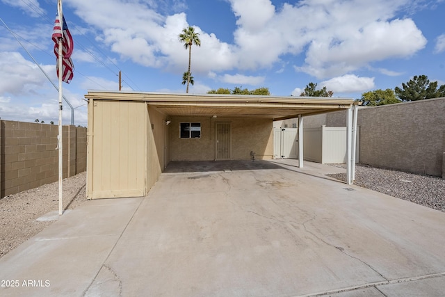 exterior space featuring a carport