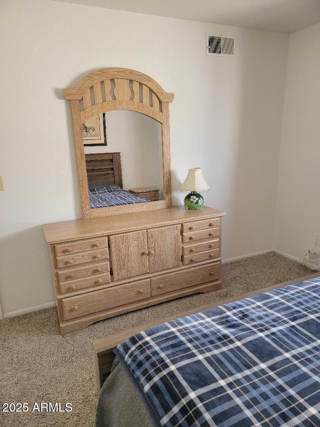 311 E Lancaster Ct, Florence, AZ 85132 - bedroom featuring visible vents, baseboards, and carpet