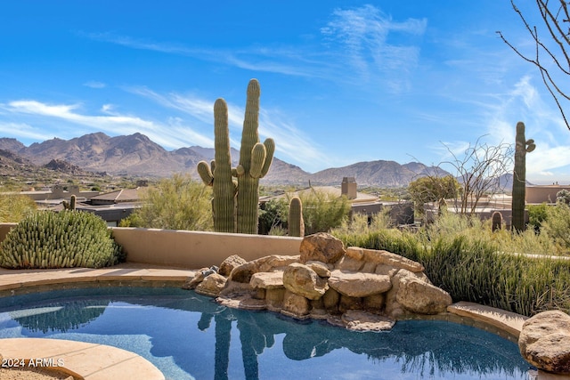 view of pool featuring a mountain view