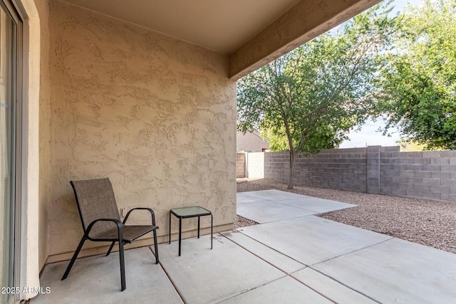 view of patio featuring a fenced backyard