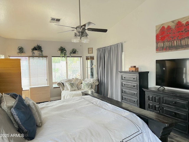 bedroom with vaulted ceiling and ceiling fan