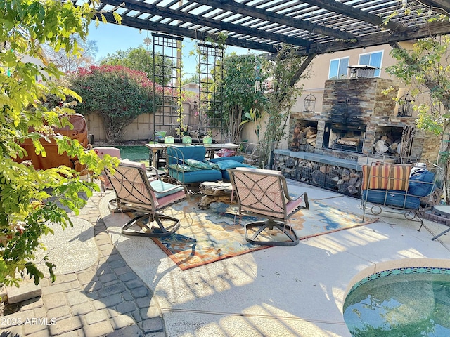 view of patio with a pergola and an outdoor stone fireplace