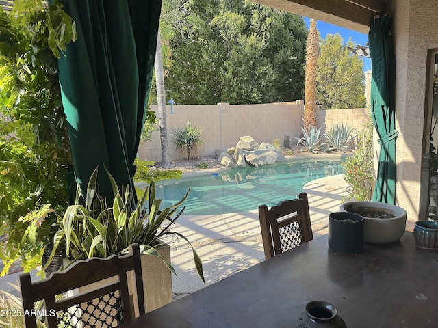 view of swimming pool featuring a patio