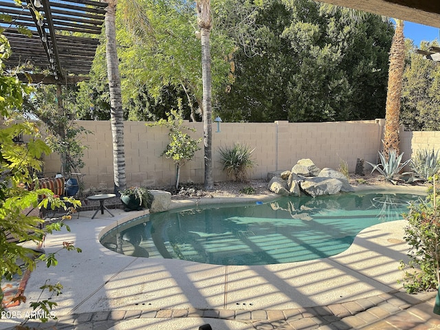 view of pool with a pergola