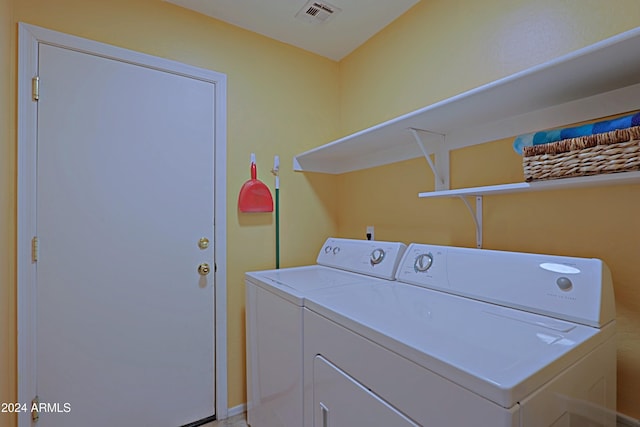 washroom featuring separate washer and dryer