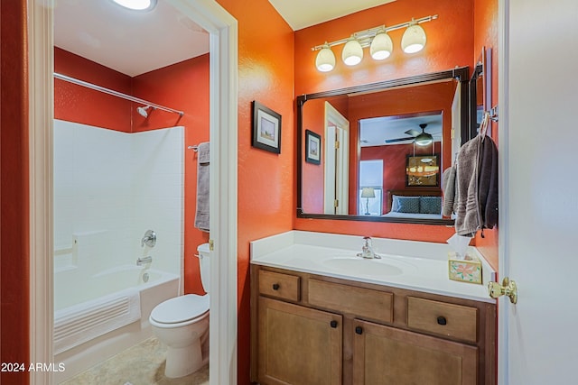 full bathroom with vanity, shower / tub combination, tile patterned flooring, toilet, and ceiling fan