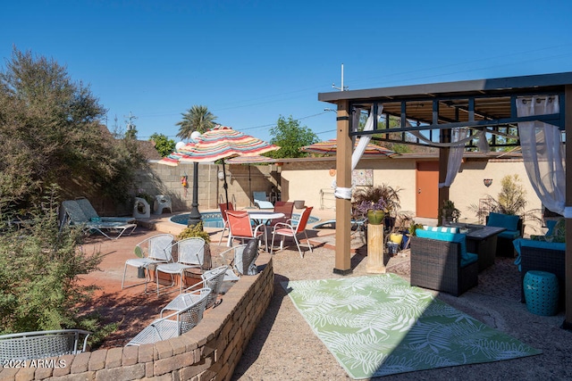 view of patio / terrace featuring outdoor lounge area and a balcony