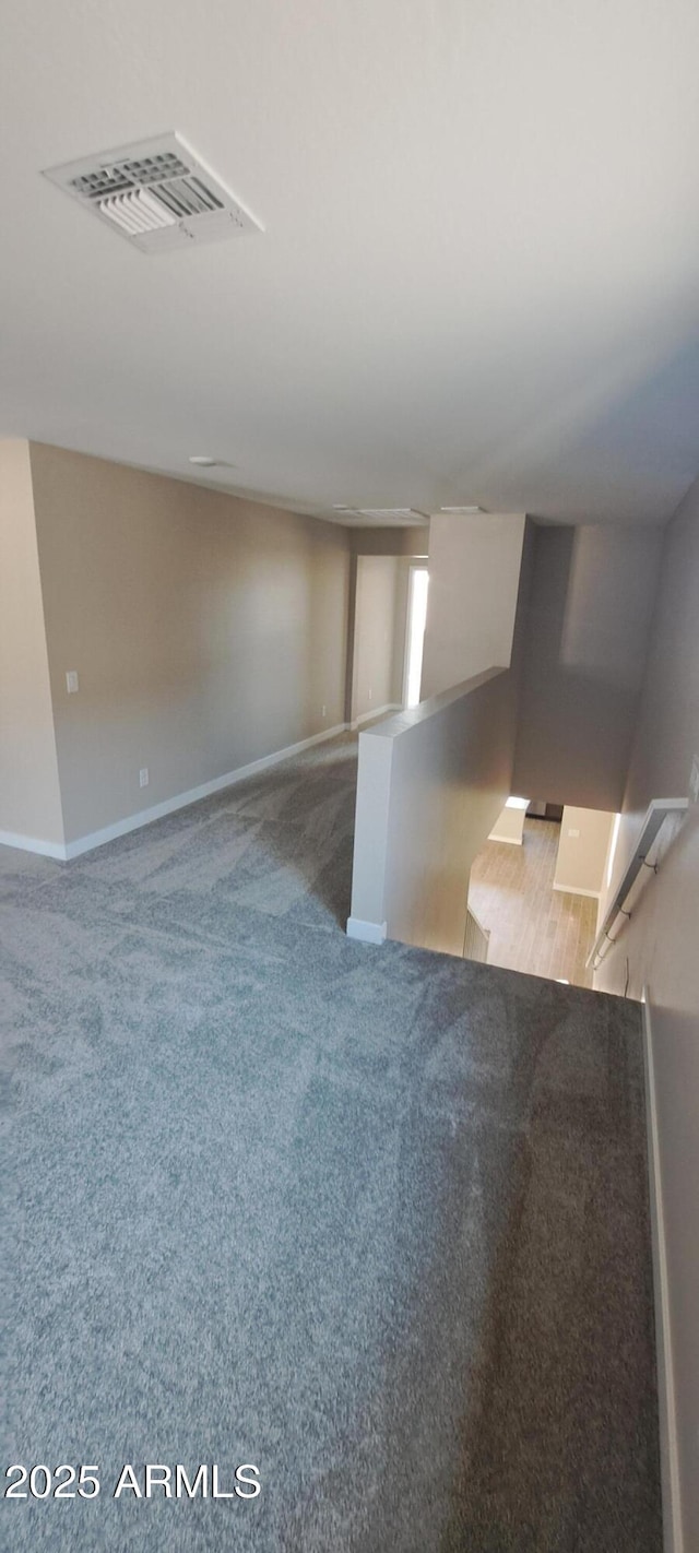 15587 S 180th Ln, Goodyear, AZ 85338 - unfurnished room featuring baseboards and carpet flooring
