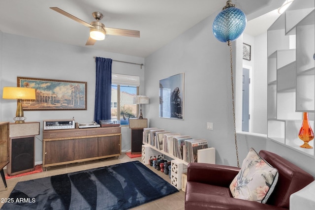 office space featuring a ceiling fan and light tile patterned floors