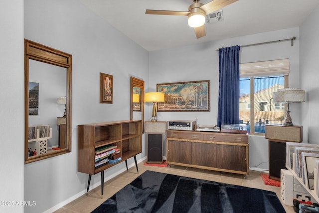 office area featuring visible vents, ceiling fan, baseboards, and light tile patterned floors