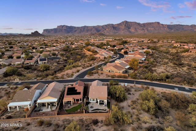 drone / aerial view with a residential view and a mountain view