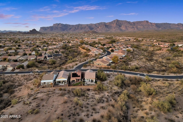 drone / aerial view featuring a residential view and a mountain view