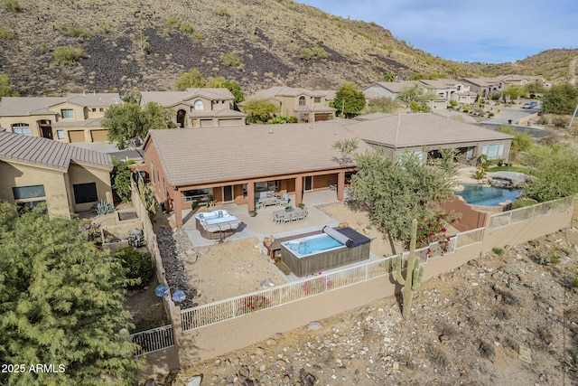 birds eye view of property featuring a residential view and a mountain view