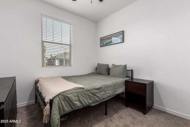 bedroom with baseboards and carpet flooring