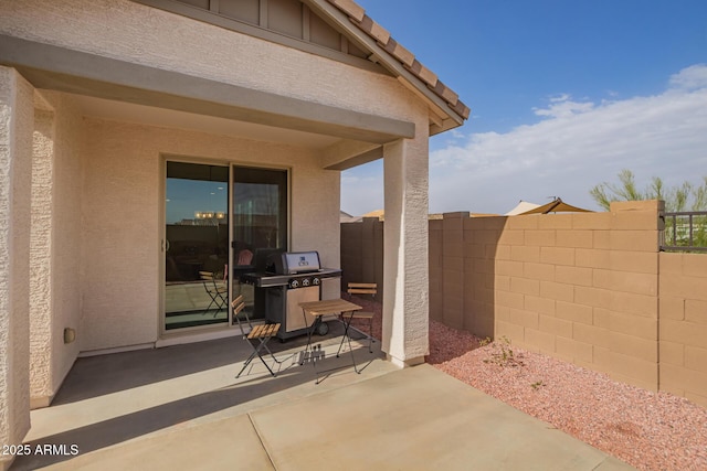 view of patio with fence