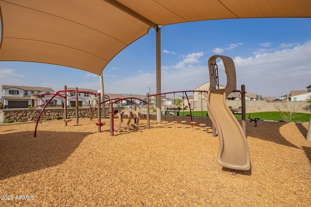 community jungle gym featuring a residential view