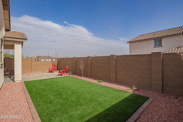 view of yard featuring a fenced backyard and a patio