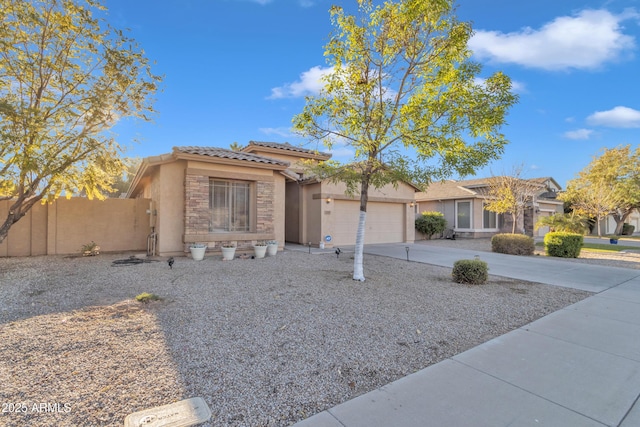 view of front of home with a garage