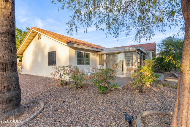 view of front of home featuring a patio area