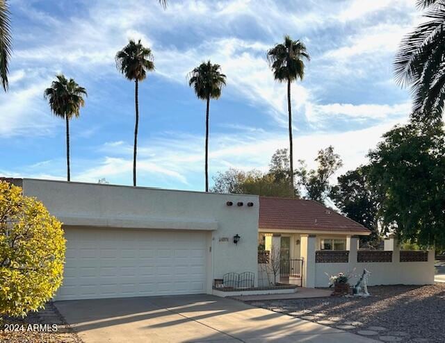 view of front of property featuring a garage