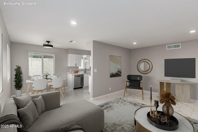 9105 N 13th St, Phoenix, AZ 85020 - living area with recessed lighting, visible vents, and marble finish floor