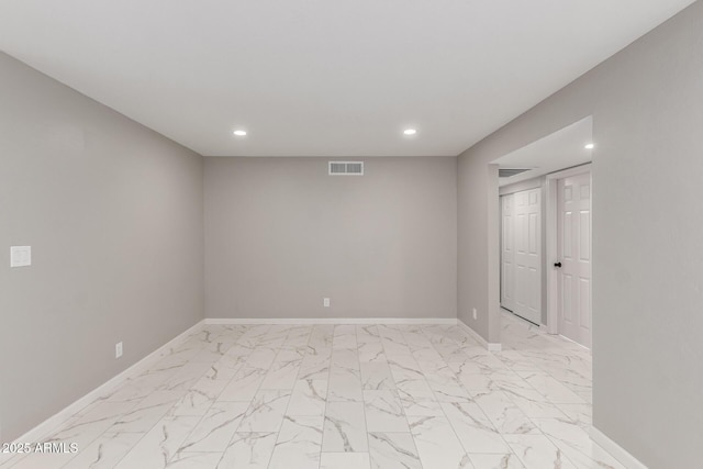 9105 N 13th St, Phoenix, AZ 85020 - unfurnished room with recessed lighting, visible vents, marble finish floor, and baseboards