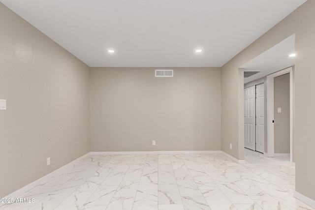 9105 N 13th St, Phoenix, AZ 85020 - empty room featuring recessed lighting, visible vents, marble finish floor, and baseboards