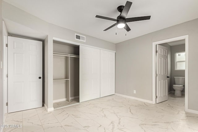 9105 N 13th St, Phoenix, AZ 85020 - unfurnished bedroom featuring visible vents, baseboards, a closet, marble finish floor, and ensuite bath