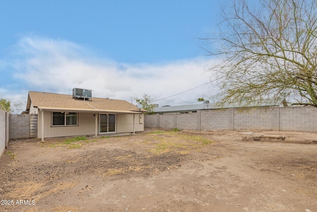 9105 N 13th St, Phoenix, AZ 85020 - back of property featuring central air condition unit, roof with shingles, and a fenced backyard