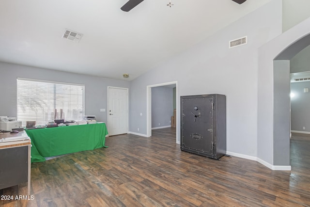 interior space featuring ceiling fan, dark hardwood / wood-style flooring, and high vaulted ceiling