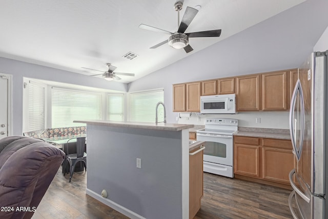 kitchen featuring ceiling fan, white appliances, dark wood-type flooring, sink, and lofted ceiling