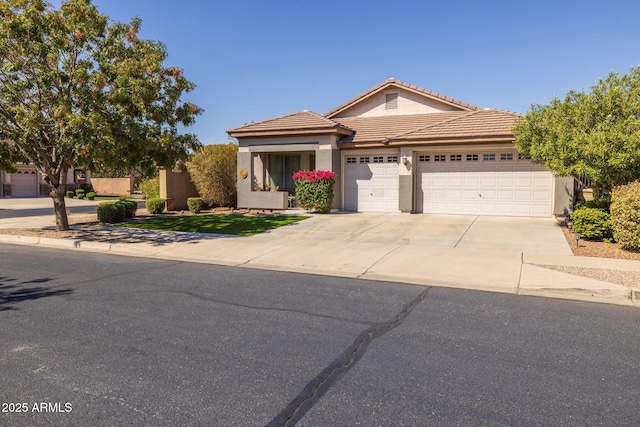 view of front of property featuring a garage