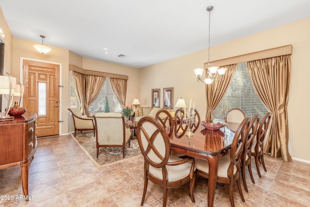 dining room with an inviting chandelier