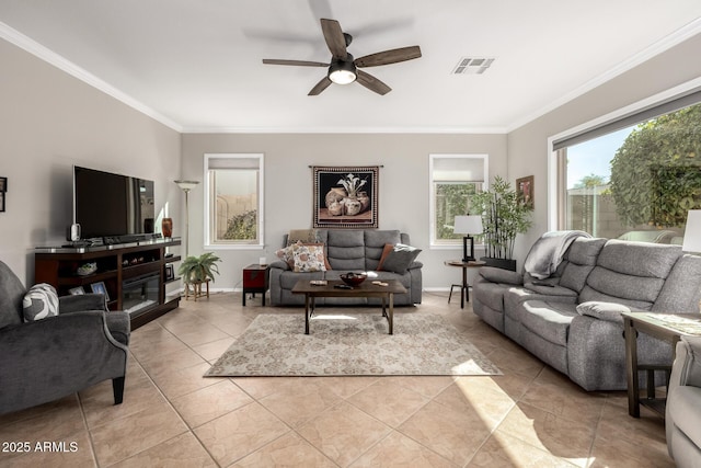 living room featuring ceiling fan, ornamental molding, and light tile patterned floors