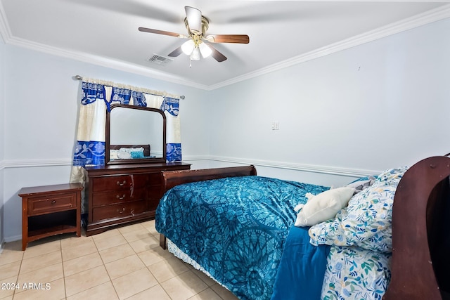 bedroom with ornamental molding, tile patterned flooring, visible vents, and ceiling fan