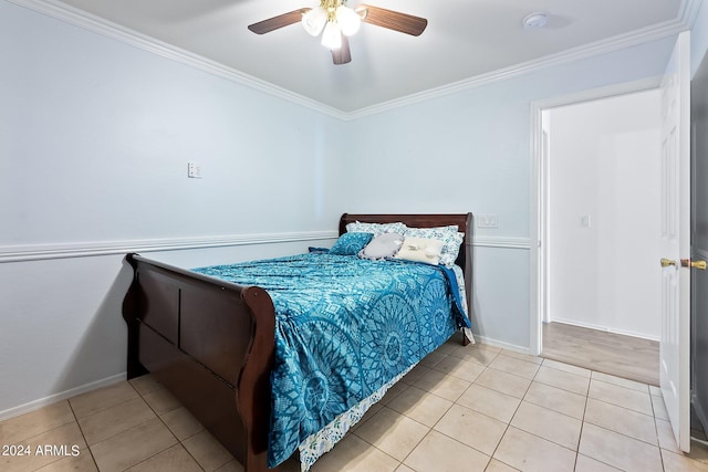 bedroom featuring baseboards, ornamental molding, a ceiling fan, and light tile patterned flooring