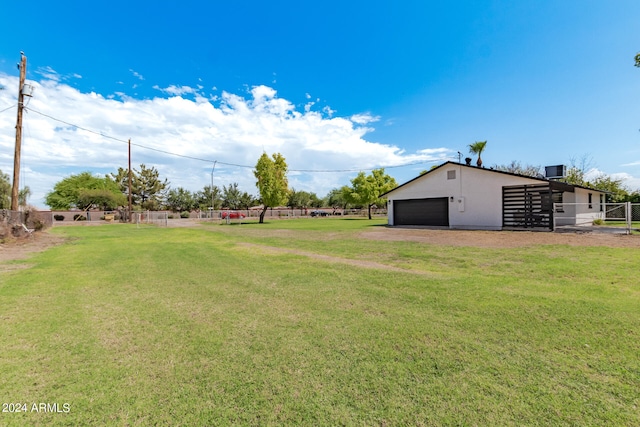 view of yard featuring a garage