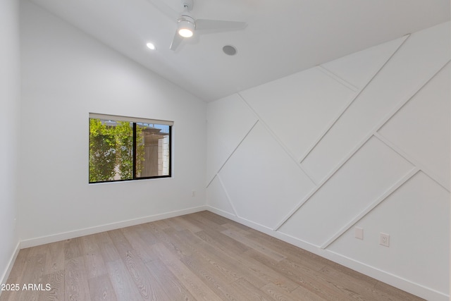 unfurnished room featuring lofted ceiling, light wood-style floors, baseboards, recessed lighting, and a ceiling fan