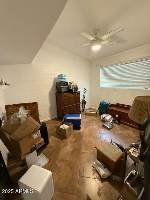 misc room featuring vaulted ceiling and ceiling fan