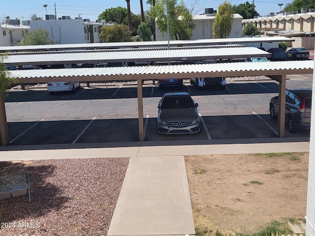 exterior space featuring a carport