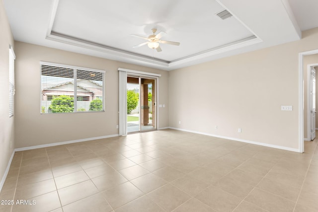 3072 E Appaloosa Rd, Gilbert, AZ 85296 - spare room with baseboards, a ceiling fan, a tray ceiling, and visible vents