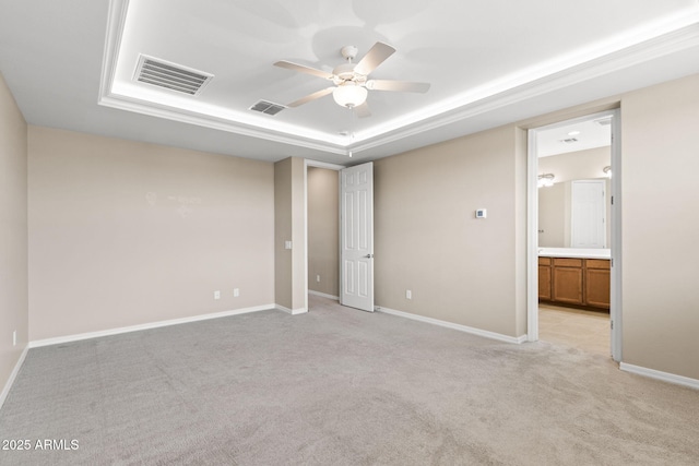 3072 E Appaloosa Rd, Gilbert, AZ 85296 - unfurnished bedroom featuring baseboards, light carpet, visible vents, and a raised ceiling